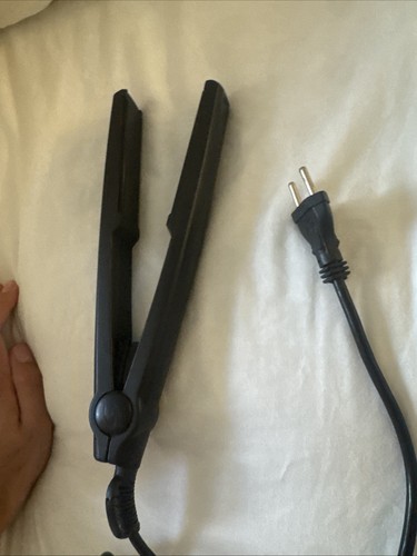 Black hair straightener - , in